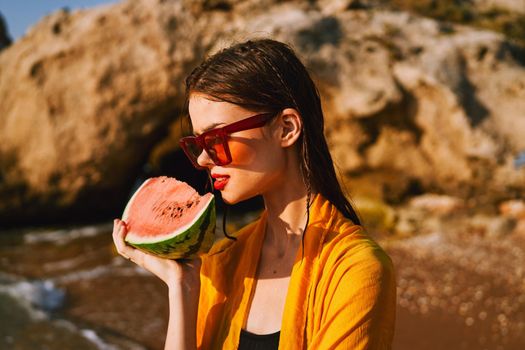 pretty woman with watermelon outdoors summer vacation. High quality photo