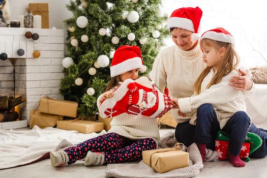 friendly family in Christmas morning.