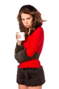 Pretty girl in christmas dress with cup of tea, isolated on white