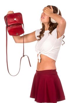 Beautiful woman looking through her pocket book purse, isolated