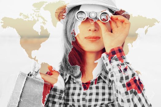 Double exposure map of the world combined with image of traveler young woman looking through binoculars outdoor
