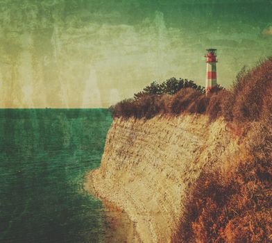 Lighthouse on coast near the sea. Image with old textured effect