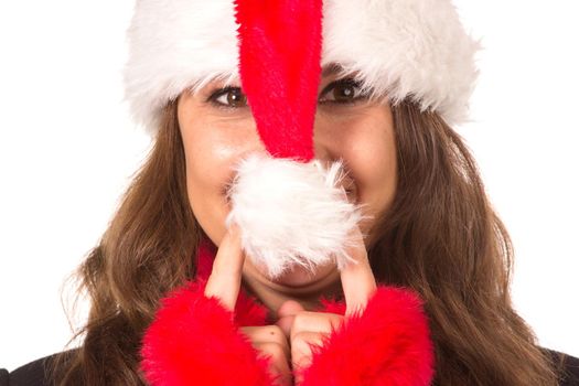 Funny harry Christmas girl with red fluffy Santa Hat. Isolated on white