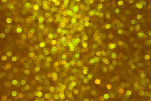 Abstract christmas lights glitter background. christmas gold texture background.