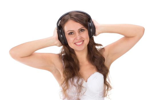 Attractive Sexy woman with beautiful body posing with headphones, isolated on white.