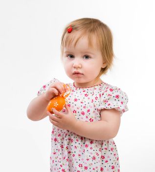 Cute little girl with easter egg. Isolated on white