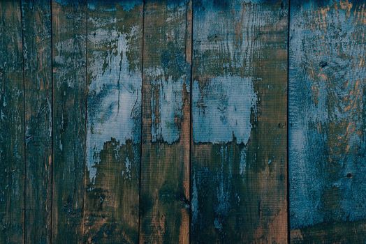 Wooden vertical striped surface of blue color, texture or background
