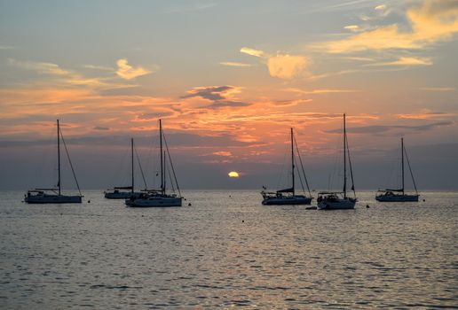 Rovinj, Croatia - May 21, 2018: Evening view on Yachts, fishing boats and the Adriatic sunset sea, Rovinj, Croatia