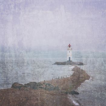 Lighthouse on rocky coast, image with old textured effect
