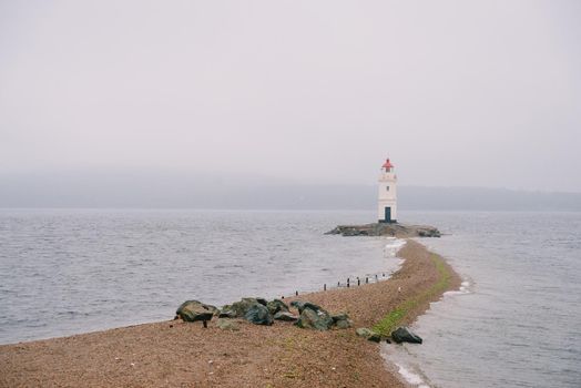 Tokarevskiy lighthouse on foreland Egersheld, Vladivostok, Russia