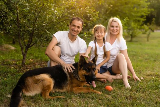 Happy family enjoying in park on sunny a day