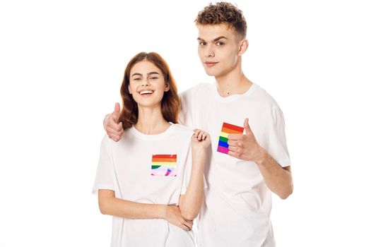 young couple lgbt Flag transgender lifestyle light background. High quality photo