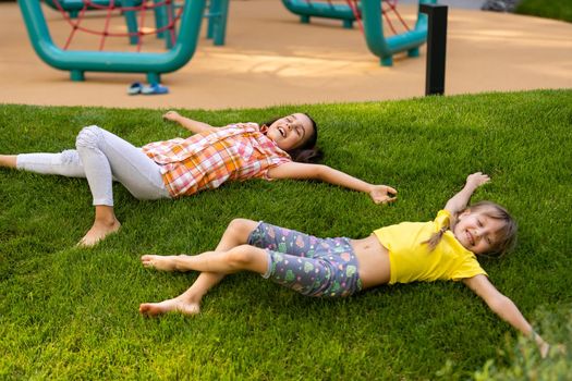 Happy children playing outdoors, children on the playground