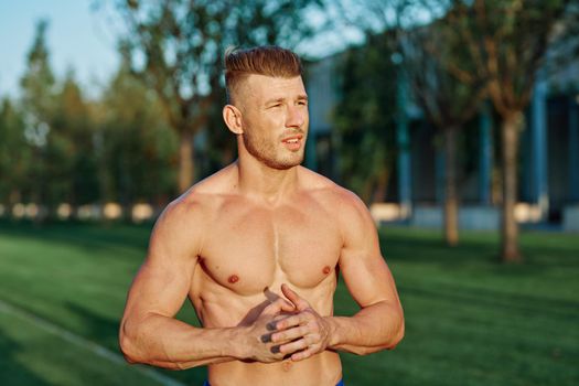 man in the park workout outdoor exercise. High quality photo