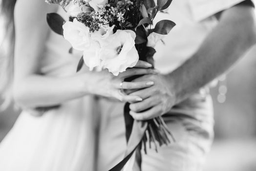 elegant wedding bouquet of fresh natural flowers and greenery