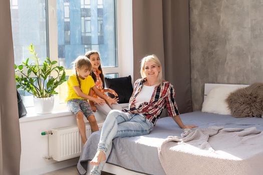 mother and two sisters at home