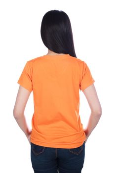 woman in orange t-shirt isolated on a white background (rear view)