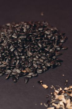 natural product sunflower seeds handing close-up food. High quality photo