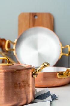 Close up of modern kitchen interior with copper cookware. High quality photo