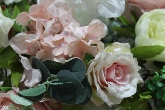 floral light background of white pink pines with light greens.