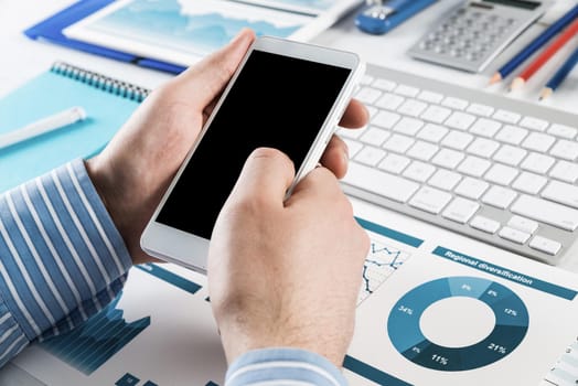 close-up of men's hands with a phone. Office work