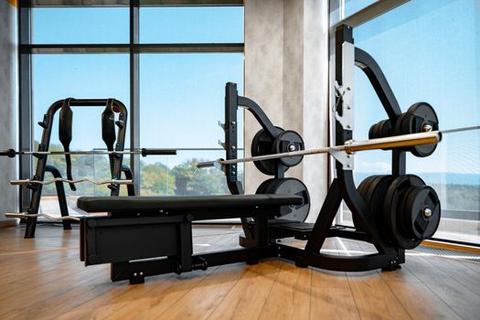 Modern gym interior with new fitness equipment, no people