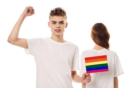 young couple lgbt Flag transgender lifestyle light background. High quality photo