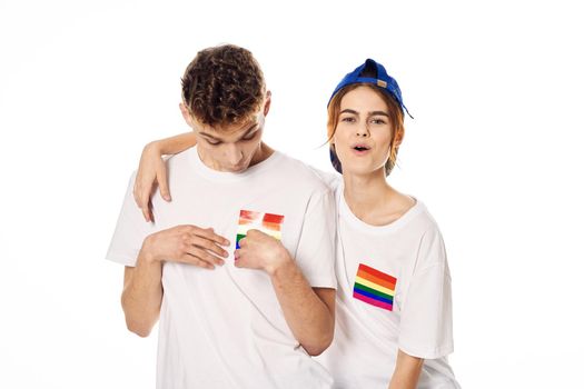 young couple lgbt Flag transgender lifestyle light background. High quality photo