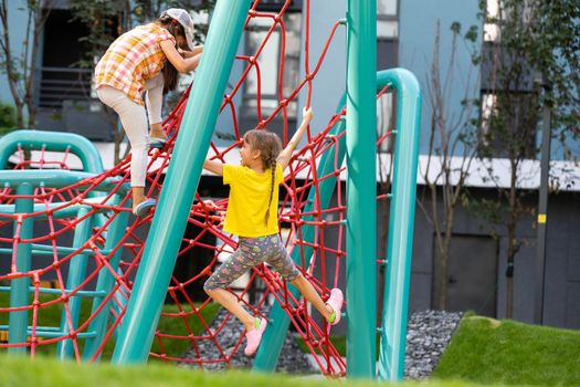 Happy children playing outdoors, children on the playground