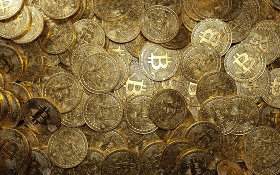 Bitcoins background. Old worn coins 3D rendering illustration
