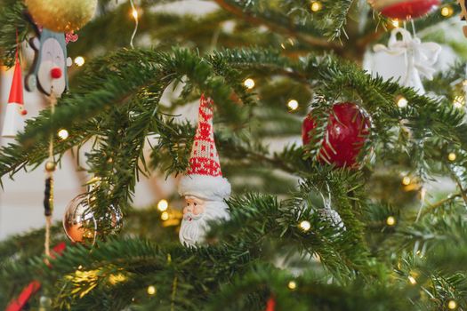 Ceramic Christmas toy Santa Claus hanging on the Christmas tree