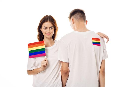 young couple lgbt Flag transgender lifestyle light background. High quality photo