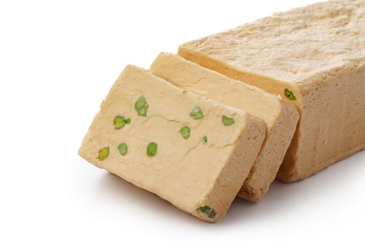 Turkish dessert halva slices isolated on white background