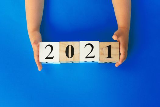 Concept of the year 2021. 2021 numbers on paper background with copy space, view from above