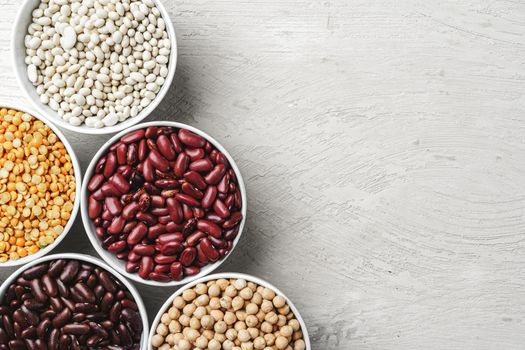 Beans assortment on white stone table