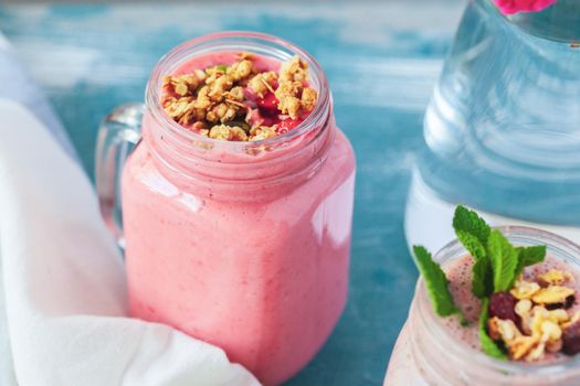 smoothie with granola for healthy breakfast. Selective focus
