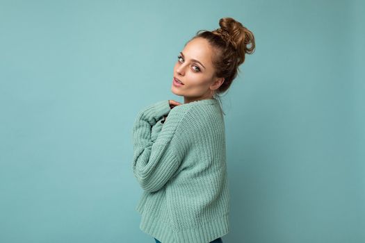 Close-up portrait of nice-looking attractive lovely lovable pretty cute winsome gorgeous cheerful cheery wavy-haired blonde woman isolated on pastel color background wearing stylish clothes.