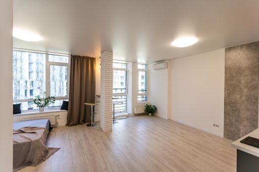 Kitchen and living room of loft apartment