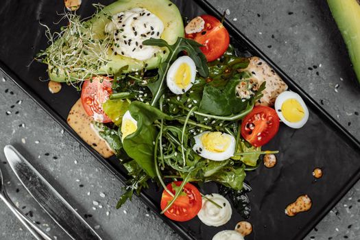 Avocado and cherry tomato salad. Diet breakfast. Healthy food.