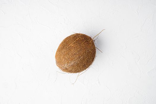 Coconut whole set, on white stone table background, top view flat lay, with copy space for text
