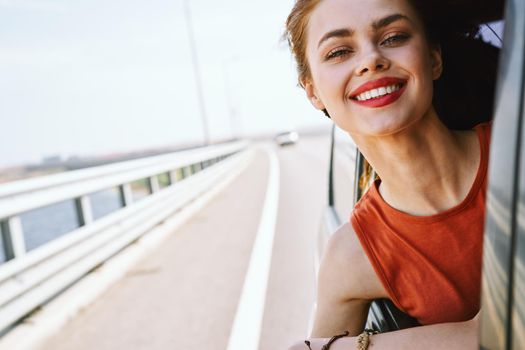 cheerful woman car ride road travel adventure. High quality photo