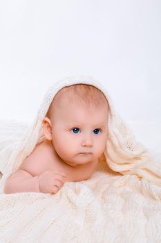 Cute baby girl on white background with isolation. Baby with a towel on his head
