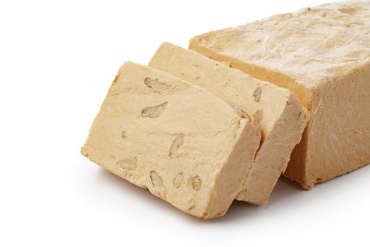Turkish dessert halva slices isolated on white background