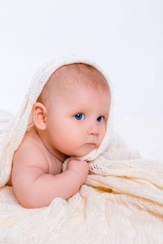 Cute baby girl on white background with isolation. Baby with a towel on his head