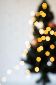Merry Christmas background. blurred christmas tree with fairy lights