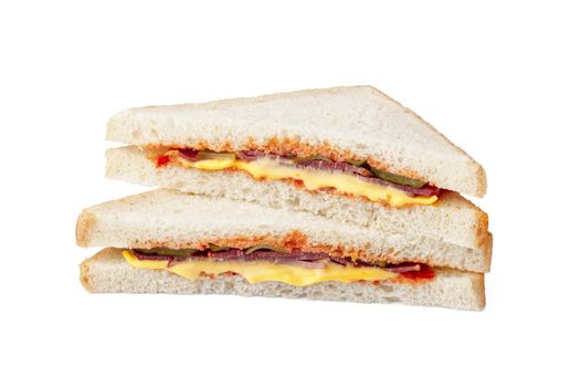 Grilled club sandwich isolated on white background, close up