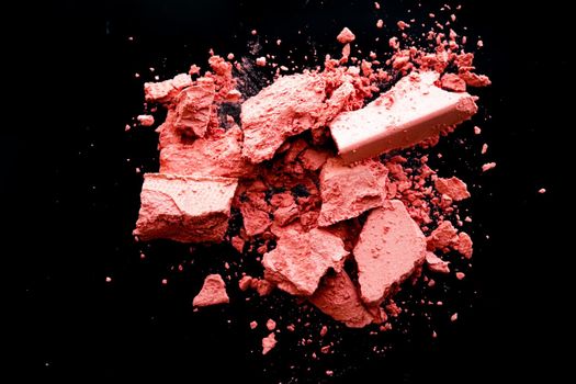 Crushed cosmetics, mineral organic eyeshadow, blush and cosmetic powder isolated on black background, makeup and beauty banner, flatlay design.