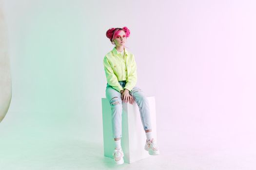 fashionable woman pink hair posing fashion clothes lifestyle fun design. High quality photo