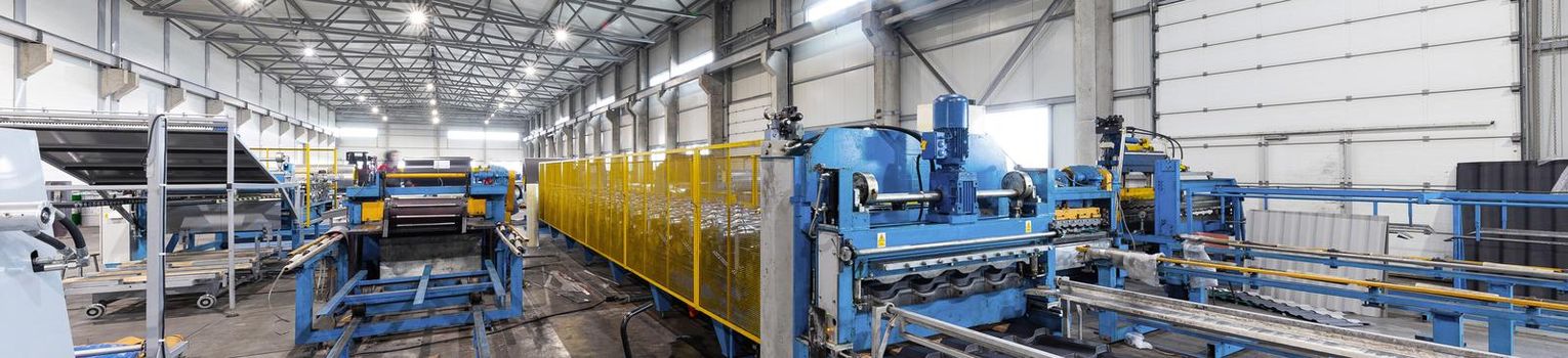 metal production industry equipment at manufacture background, wide-focus lens