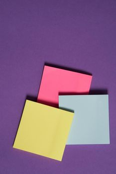 colorful stickers office supplies hobby drawing purple background. High quality photo